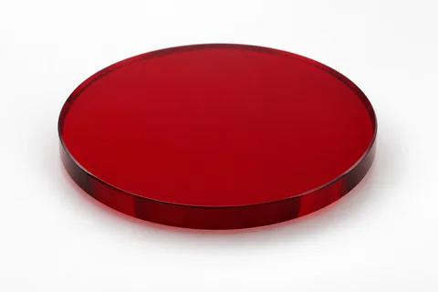 Circular color glass optical filter on a neutral background