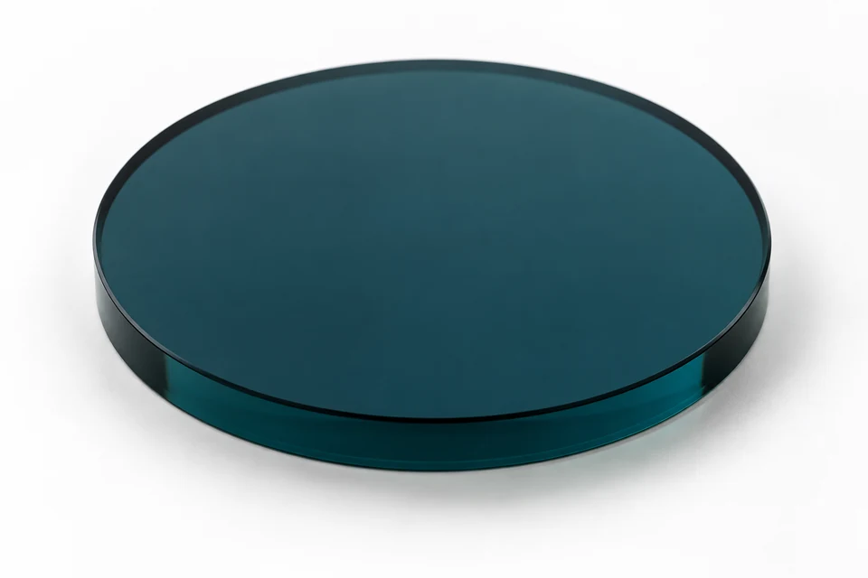 Circular heat absorbing optical filter on a neutral background