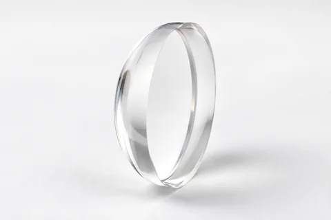 Meniscus optical lens on a neutral background