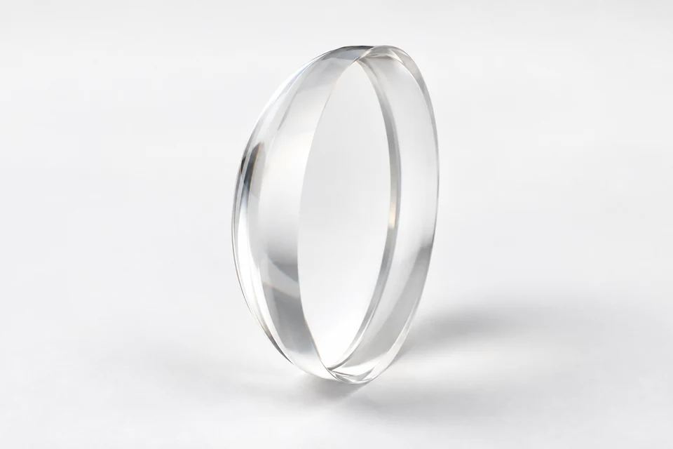 Meniscus optical lens on a neutral background